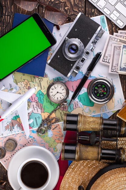 Travel items and accessories on the table.