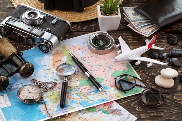 Travel items and accessories on the table.