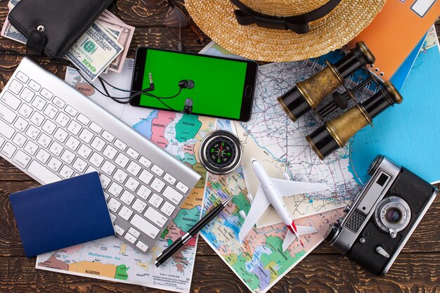 Photo travel items and accessories on the table.