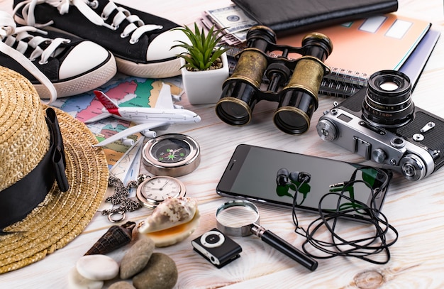 Travel items and accessories on the table.