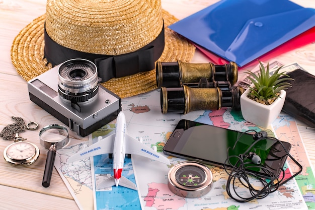 Travel items and accessories on the table.