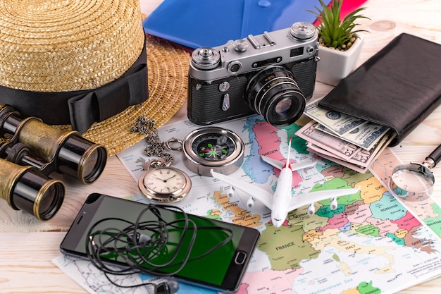 Travel items and accessories on the table.