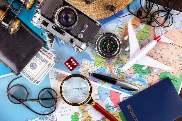 Travel items and accessories on the table.