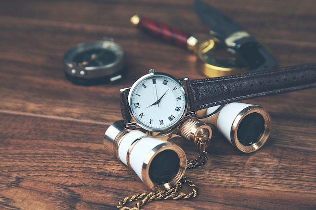 Photo travel items on wooden table background