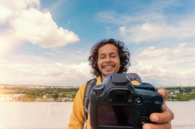 Travel man making content video on camera for travel blog