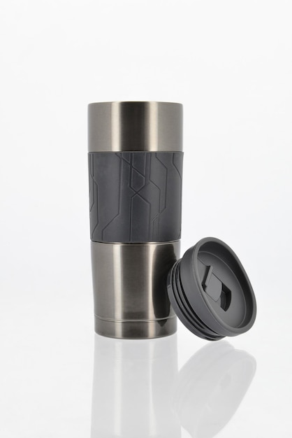 Travel mug vacuum flask on a white background