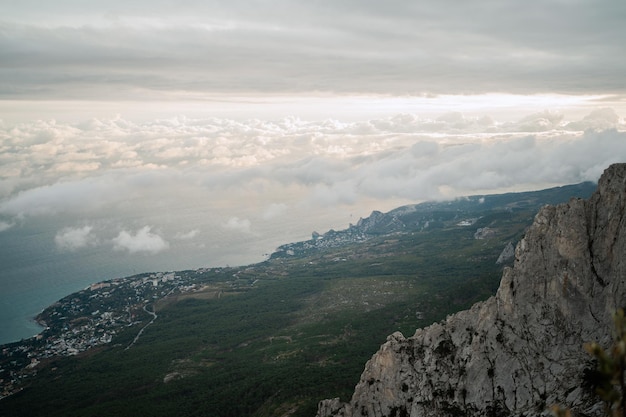 Travel in nature there are dangerous big rock with a sharp cliff high beautiful view of Mount