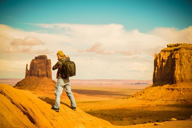 Travel photographer at work arizona monuments valley male photographer