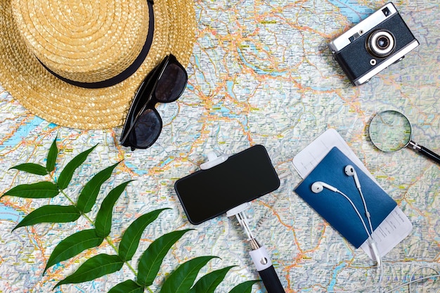 Travel plan trip vacation accessories for trip tourism mockup outfit of traveler on map background