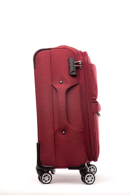 Travel red suitcase isolated