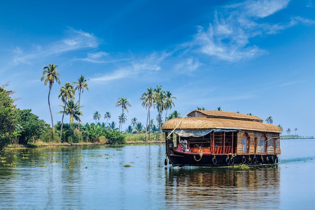 Travel tourism Kerala background houseboat on Kerala backwaters Kerala India