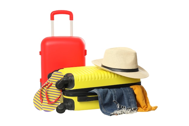 Travel and vacation composition with suitcase isolated on white background