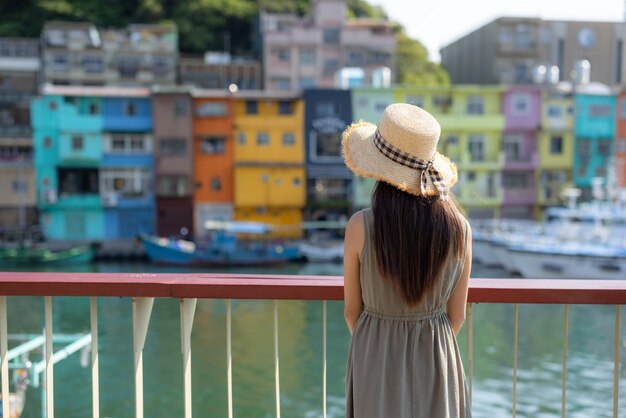 Travel woman visit Zhengbin fish port in Keelung of Taiwan