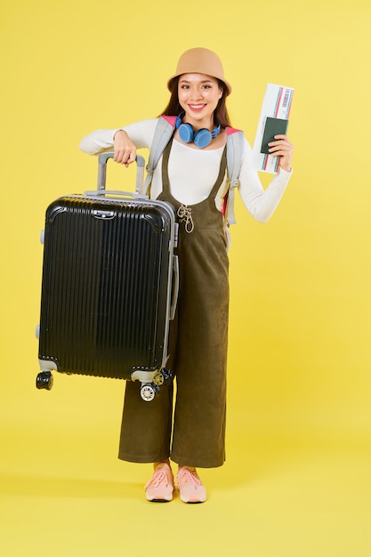 Traveler lifting suitcase