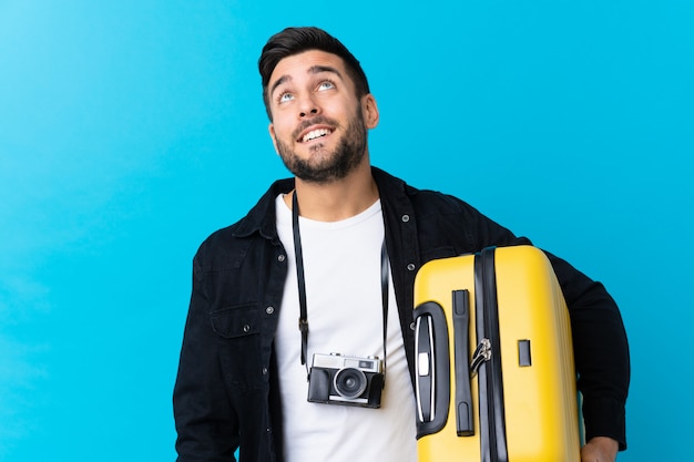 Traveler man with suitcase