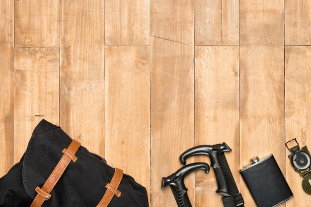 Traveler set on wooden background flat lay