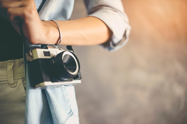 A traveler with a camera with a background to enter text