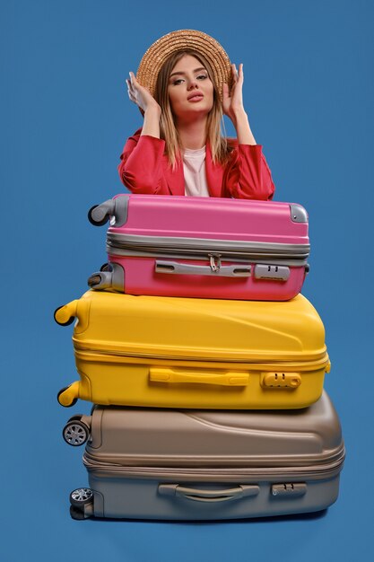 Traveler young woman with suitcase. Travel concept