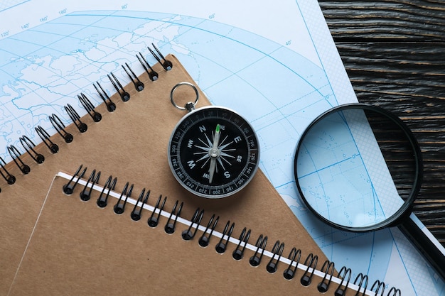 Photo traveling adventure and vacation concept with compass