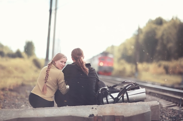 Photo traveling with a backpack on foot and hitchhiking