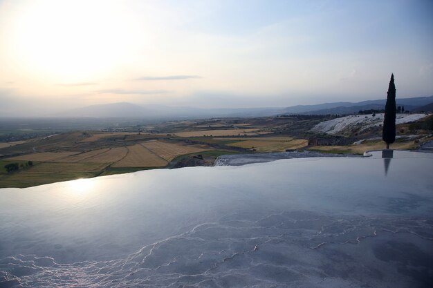 Travertines in Pamukkale at sunset
