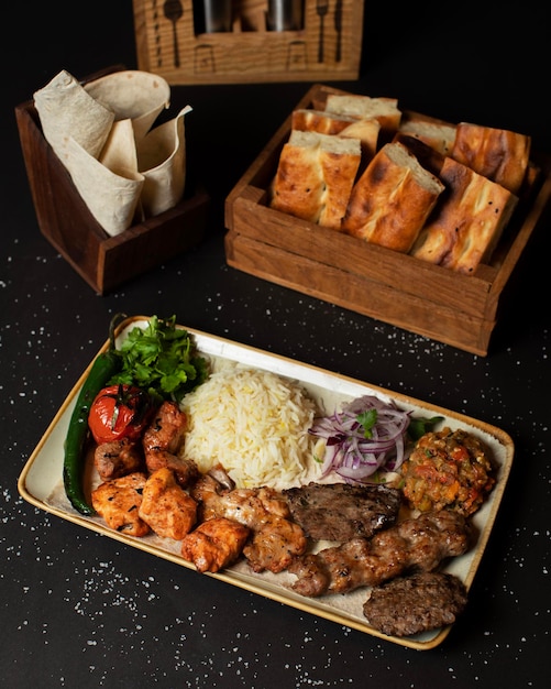 A tray of food with bread in it and a sign that says " the word " on it "