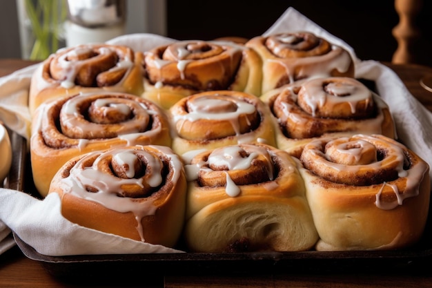 A tray of warm and gooey cinnamon rolls ready to be served created with generative ai