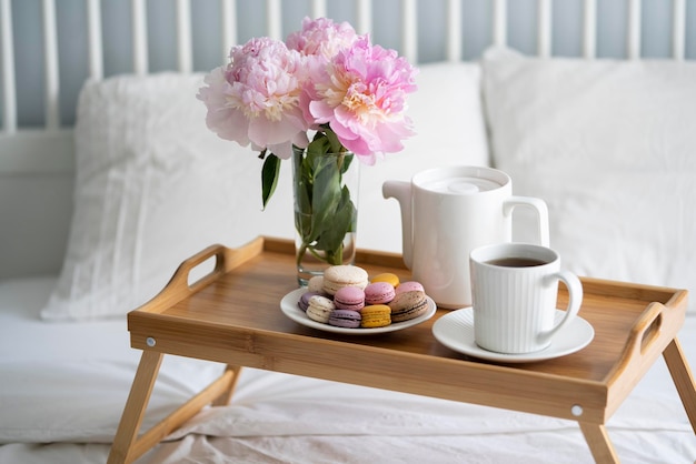 Tray with breakfast on bed