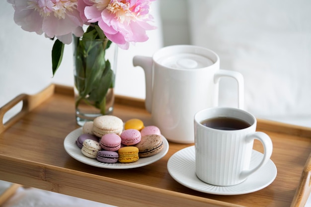 Tray with breakfast on bed