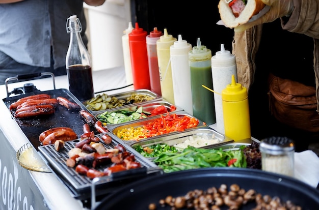 Tray with cooked food on showcase at cafeteria