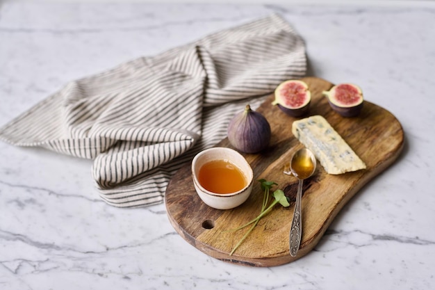 Tray with exotic fruits and honey