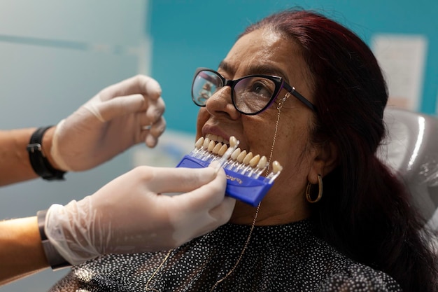 Photo treatment of dental prostheses in a patient who lost his teeth