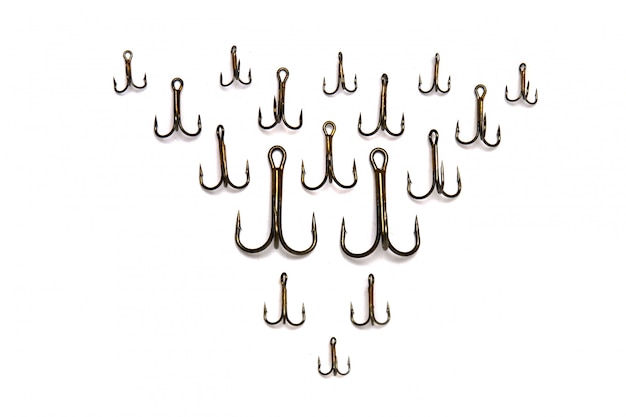 Treble fish hooks isolated on a white background.