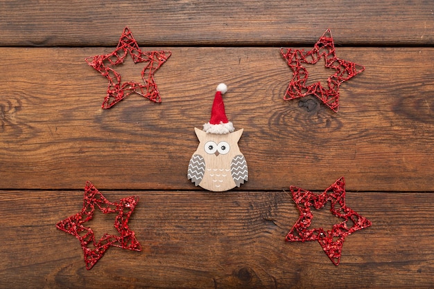 Tree figures, Christmas stars on oak table