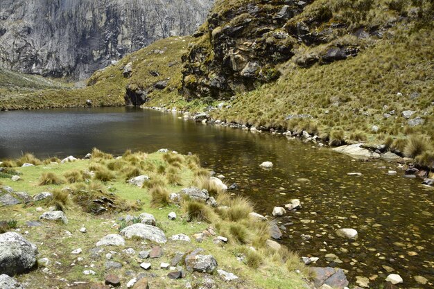 Trekking in laguna 69 a picturesque valley between the\
mountains on the way to the lagoon 60 peru