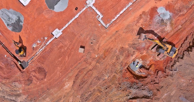 An a trench being prepared for pouring concrete to the foundations of a large construction site