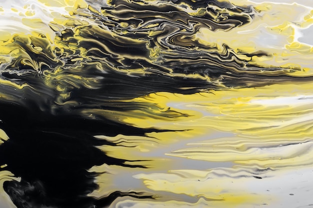 Trending colors of 2021. Gray, yellow and black waves flow. Marble effect background or texture. Fluid Art.