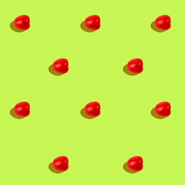 trendpatroon rode tomaat op een lichtgroene achtergrondfoto