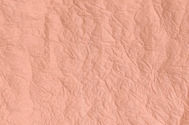 Trendy Cantaloupe colored textured backgroun, Crumpled paper texture.