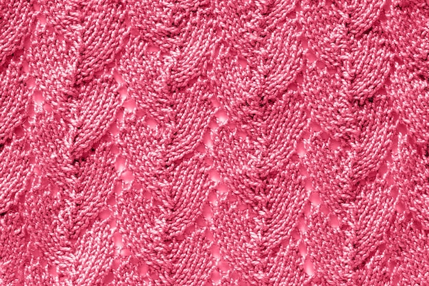 Trendy color of the year 2023 Texture patterned knit fabric toned in viva magenta color