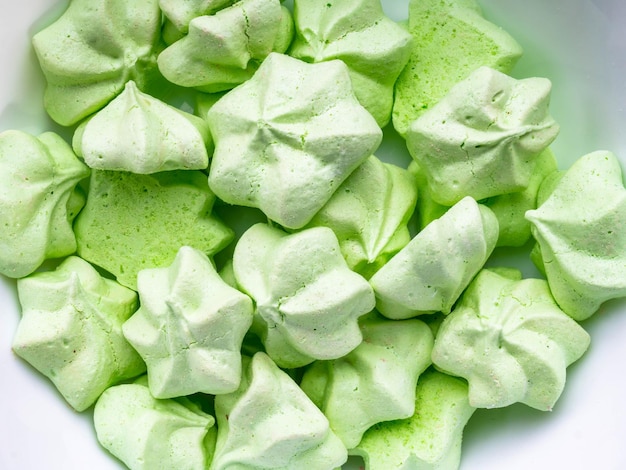 Trendy dessert Mint meringues Bakery products background sweet dessert