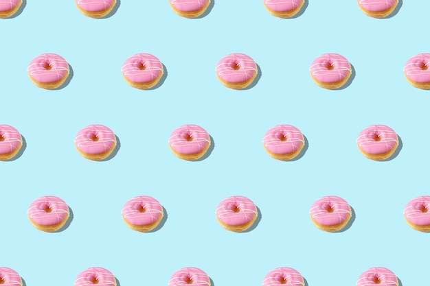 Trendy summer pattern with pink donut blue