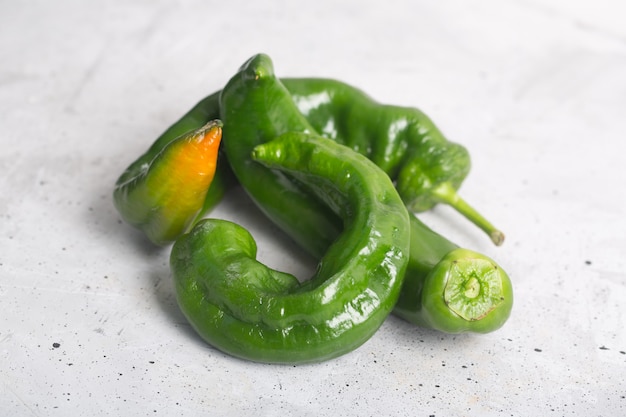 Trendy ugly organic pepper on the table