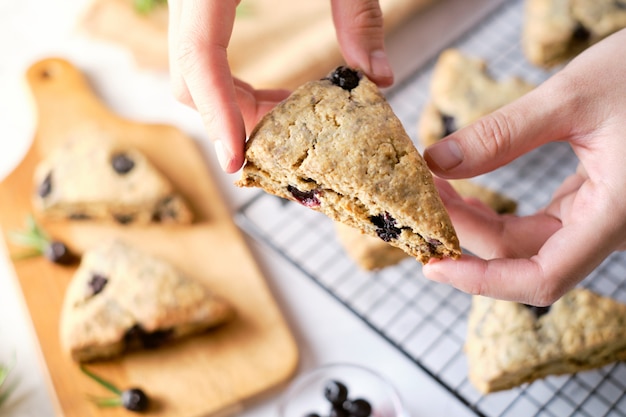 Triangle blueberry scones. a Traditional British baked good. set on cafe table.