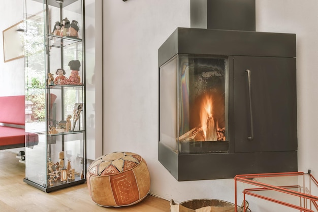 Triangular black burning fireplace