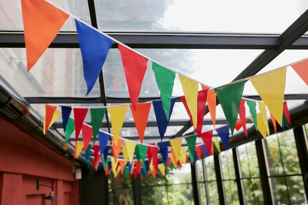 triangular multi-colored flags in the interior of the restaurant