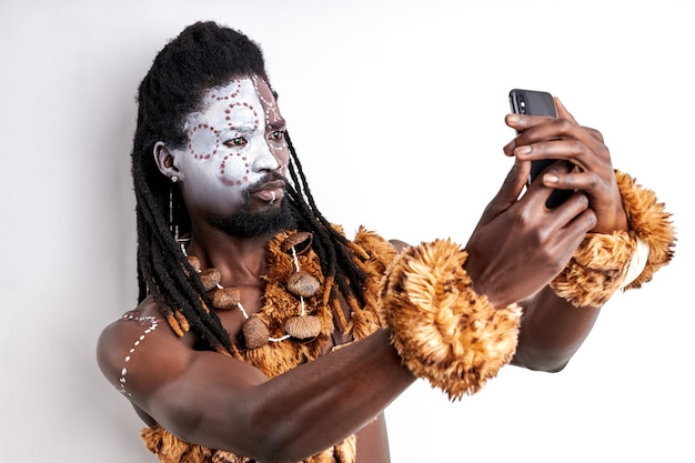 Tribal man makes selfie