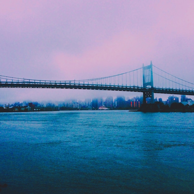 Triborough bridge against sky in east river seen from astoria park