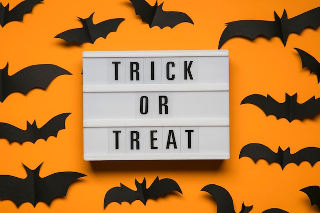 Trick or Treat halloween lightbox message with black scary bats