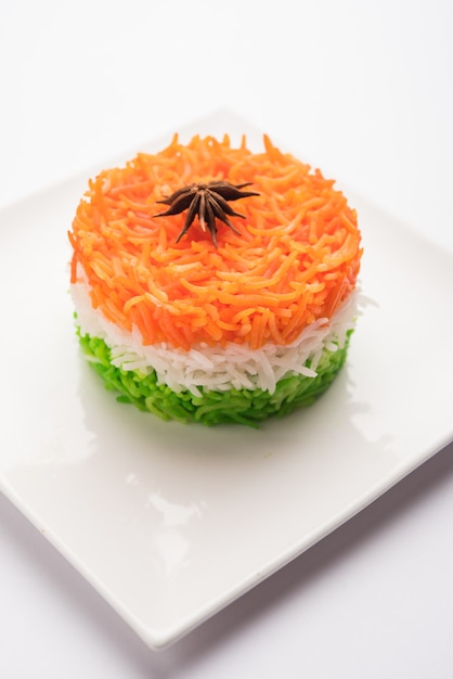 Tricolor Tiranga Rice for indian Republic and Independence day, served in a ceramic plate, selective focus